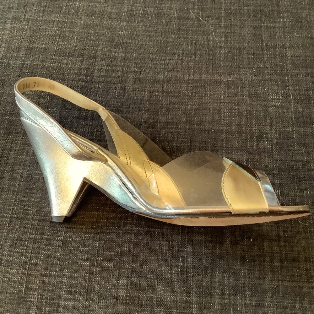 Ted Land. Clear with gold, bronze and silver trim, silver heels.